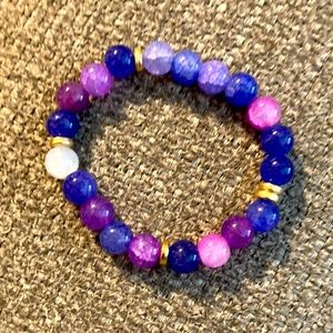 This is a marble bracelet hand made by me and the color is all types of purples